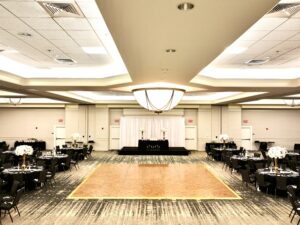 A large room with tables and chairs in it