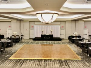 A large room with a big dance floor