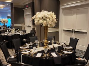 A table set up with black and white plates