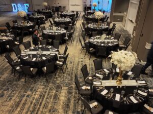 A large room with many tables and chairs