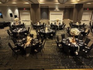 A large room with many tables and chairs