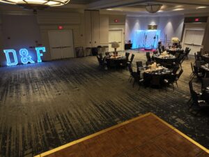 A room with several tables and chairs in it