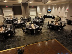 A large room with many tables and chairs