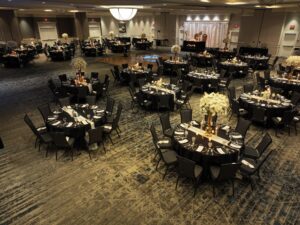 A large room with many tables and chairs