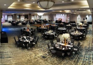 A large room with many tables and chairs