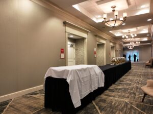 A long table with white cloth on it