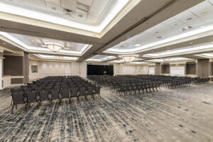 A large room with many chairs and tables